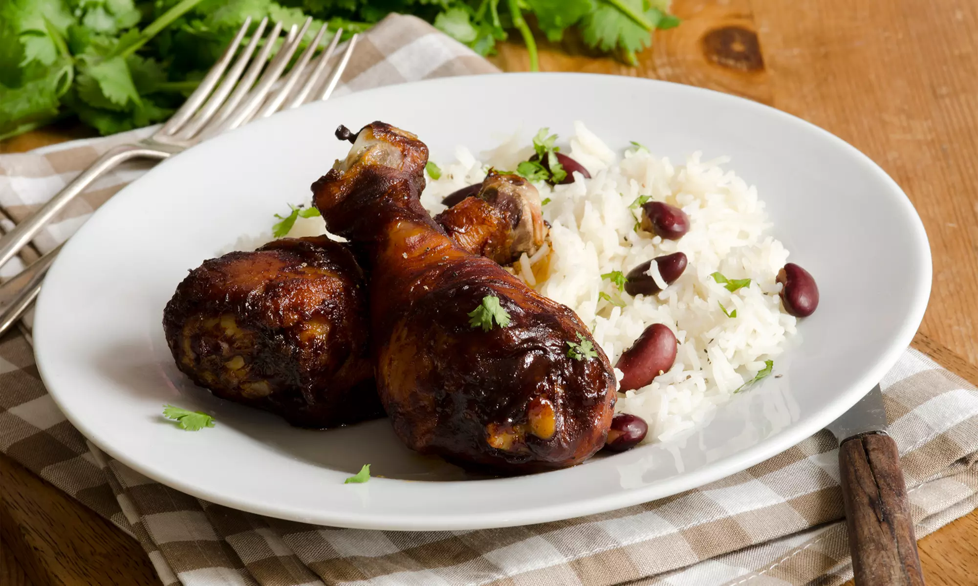 Caribbean Cuisine for Takeout or Dine-In at Jerk N' Jive Bar & Kitchen (Up to 25% Off). Two Options Available. - Primary Image