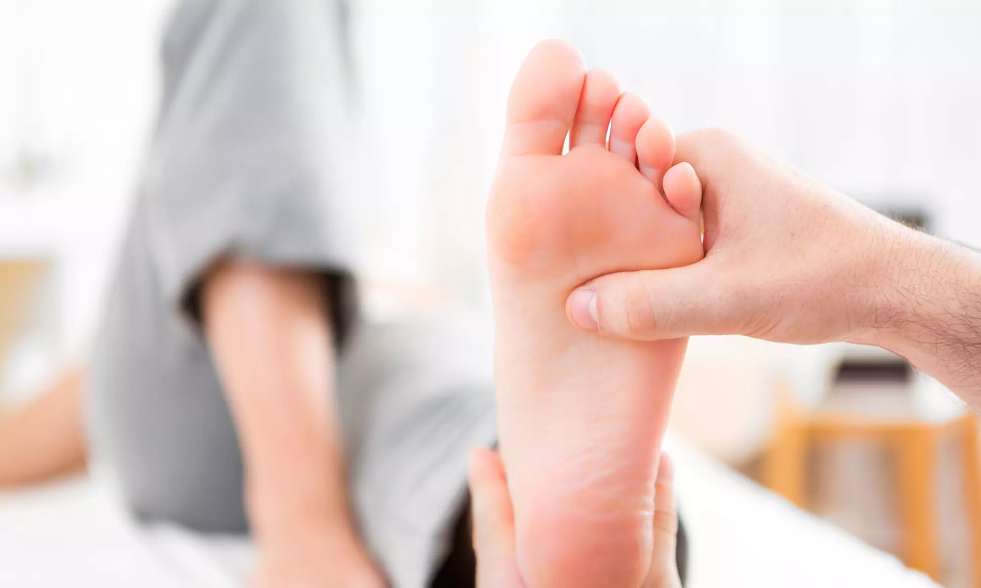 Massage or Reflexology with Hot Stones at Aurora Foot and Body Spa (Up to 34% Off). Four Options Available. - Primary Image