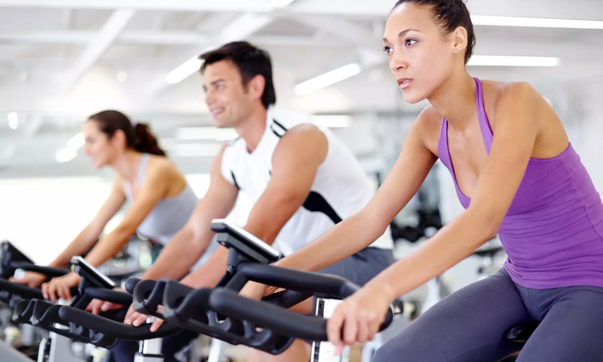 Experience Unleashed Cycle Studio's indoor cycle classes with options for five or three classes, offering up to 50% off - Primary Image