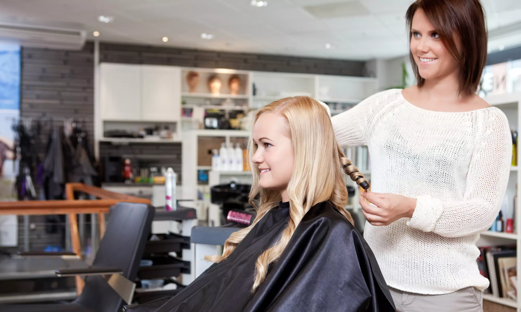 Haircut and Style with Optional Single Process Color or Highlights at Colors Hair & Skin Studio (Up to 39% Off) - Primary Image