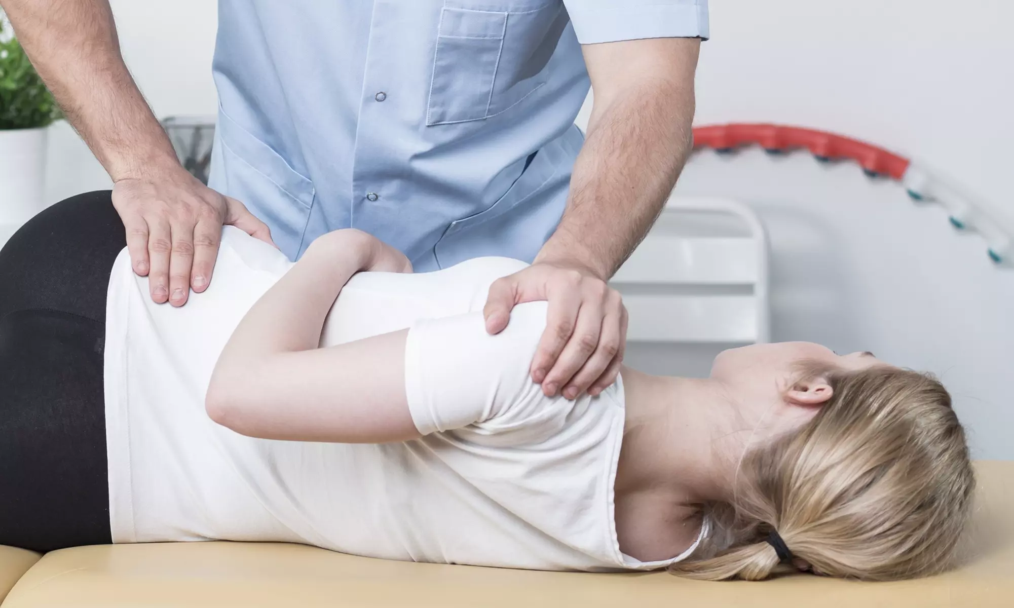Up to 80% Off on Chiropractic Consultation, Exam and Adjustment at AXE Chiropractic - Primary Image