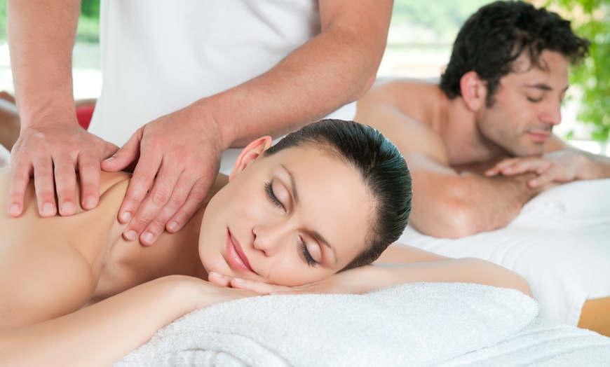 Image 1: Unwind Together w/ 60-, or 90-Min Choice of Couples Massage Sessions