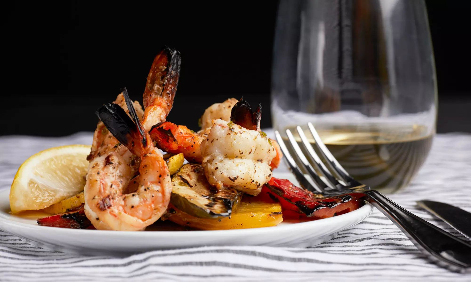 Menu con grigliata di pesce e calice di vino per 2 o 4 persone al ristorante La Vecchia Chiusa - Primary Image