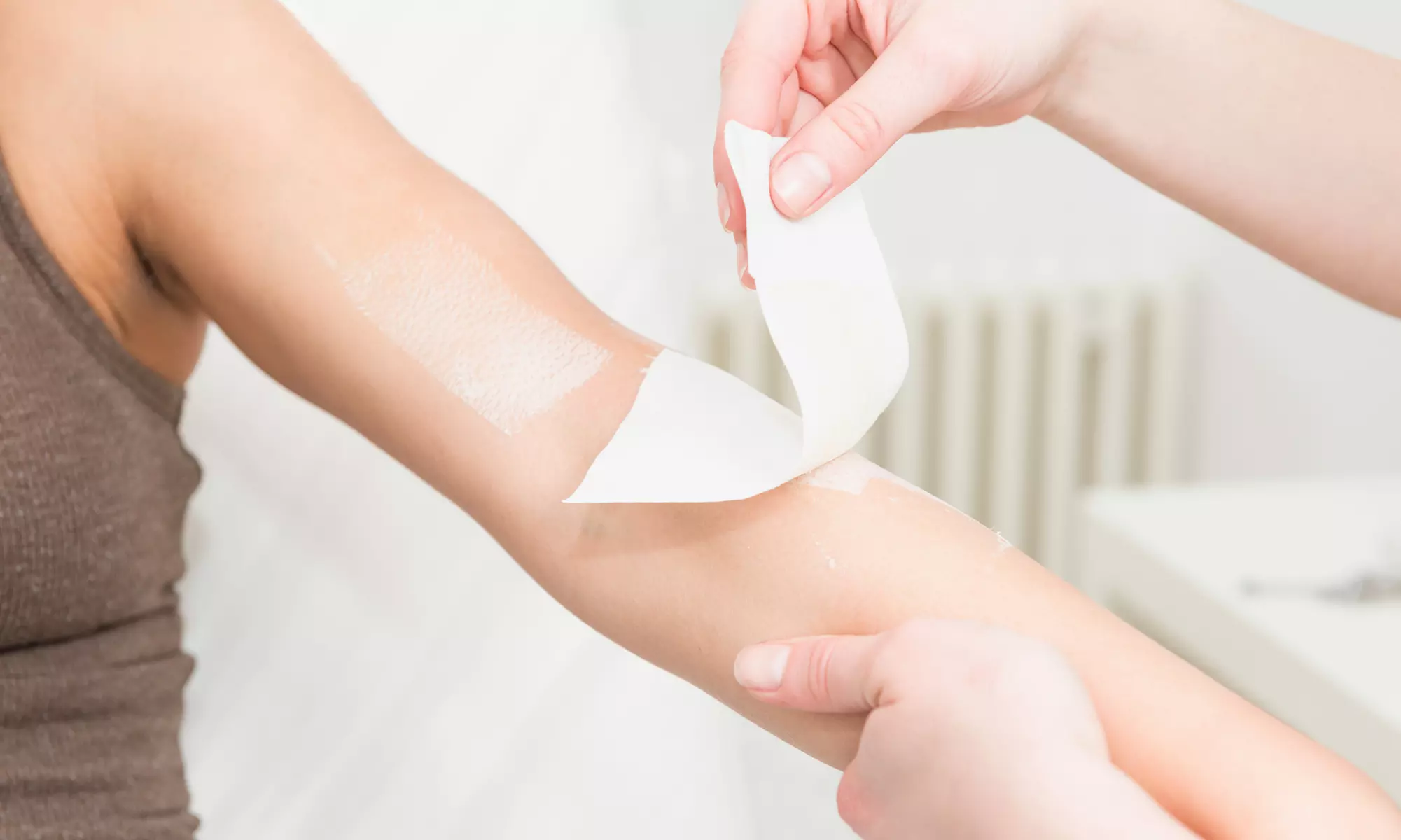 Achieve Smooth Skin with 1 Full Face Wax, or 1/3 Underarm Wax at Alluring Esthetics - Up to 40% Off - Primary Image