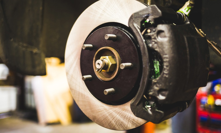 Image 1: Stop on a Dime! Unleash the Power of Expert Brake Inspections Today! 