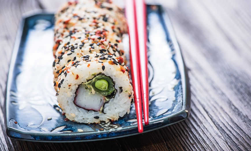 Image 1: Sushi Roll and Soft Drink