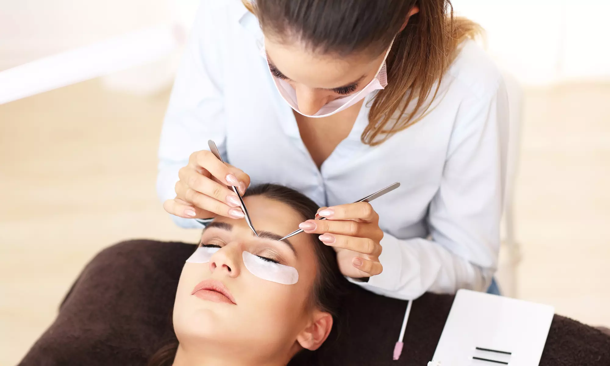 Get fuller, longer lashes with Lash Bar's eyelash extensions and lash lift options, offering up to 56% off - Primary Image