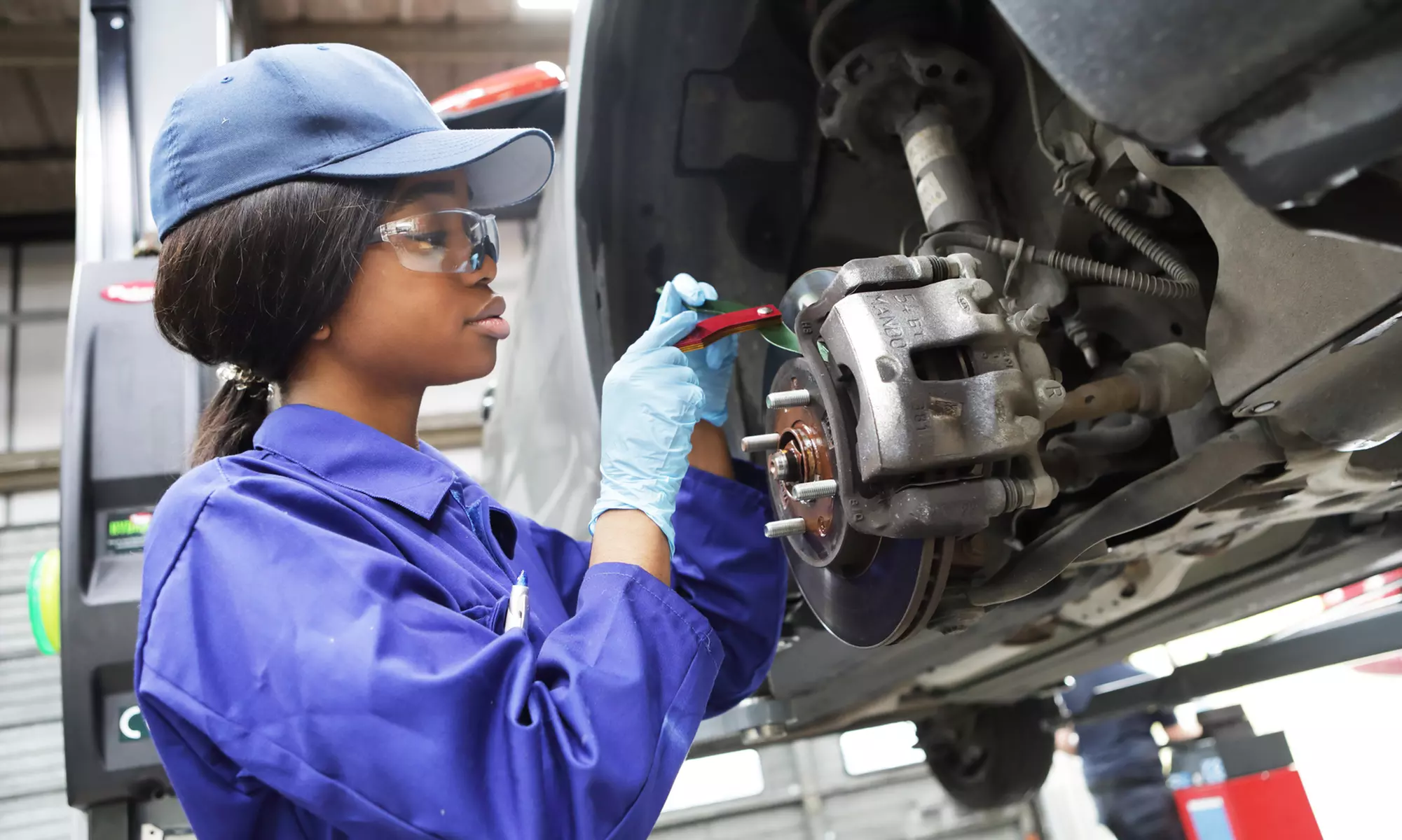 Front or Rear Brake Pad and Rotor Replacement at Craftsman Auto Care (Up to 22% Off). 3 Locations Available. - Primary Image