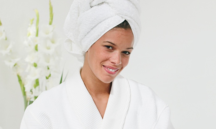 A serene spa setting with professional staff offering a variety of beauty and relaxation treatments.