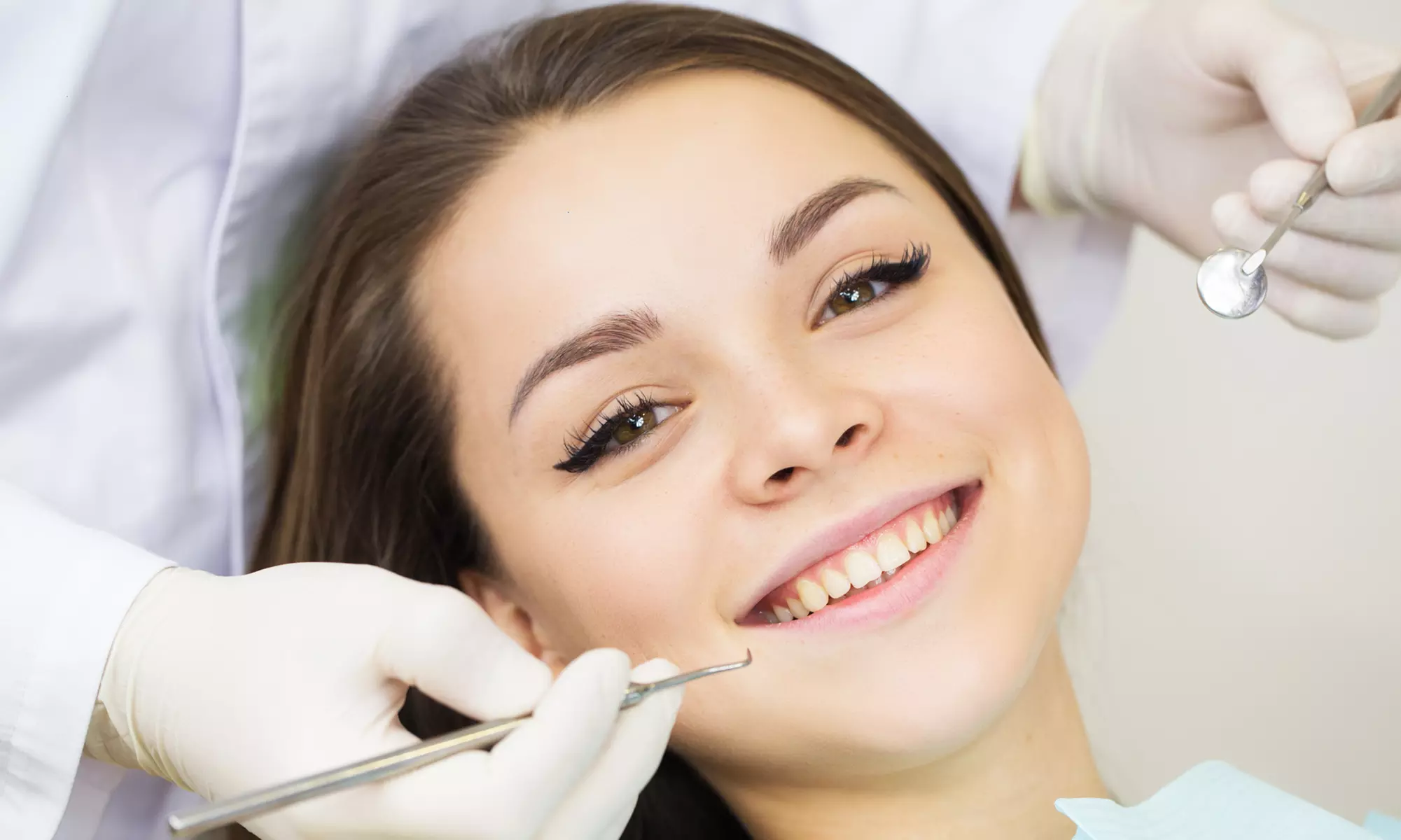 Dental Check-Up Pkg for 1 or 2 People, or Dental Check-up and X-Ray for 1 Person at Design Dental Surgery, 3 Locations - Primary Image