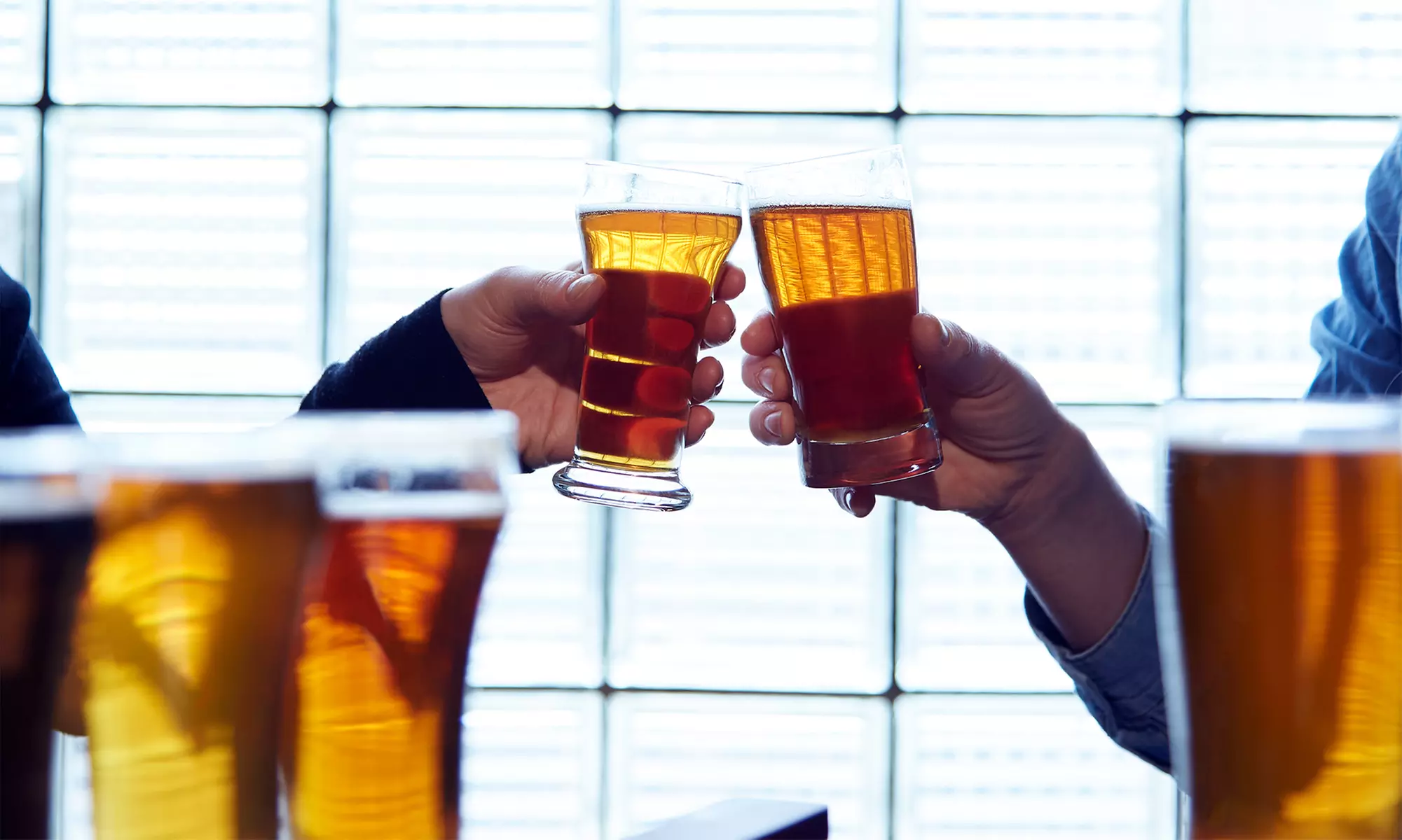 Flight of Craft Beer or Cider with Appetizer and Two Take Home Six Packs at Two Henrys Brewing Co (Up to 44% Off) - Primary Image