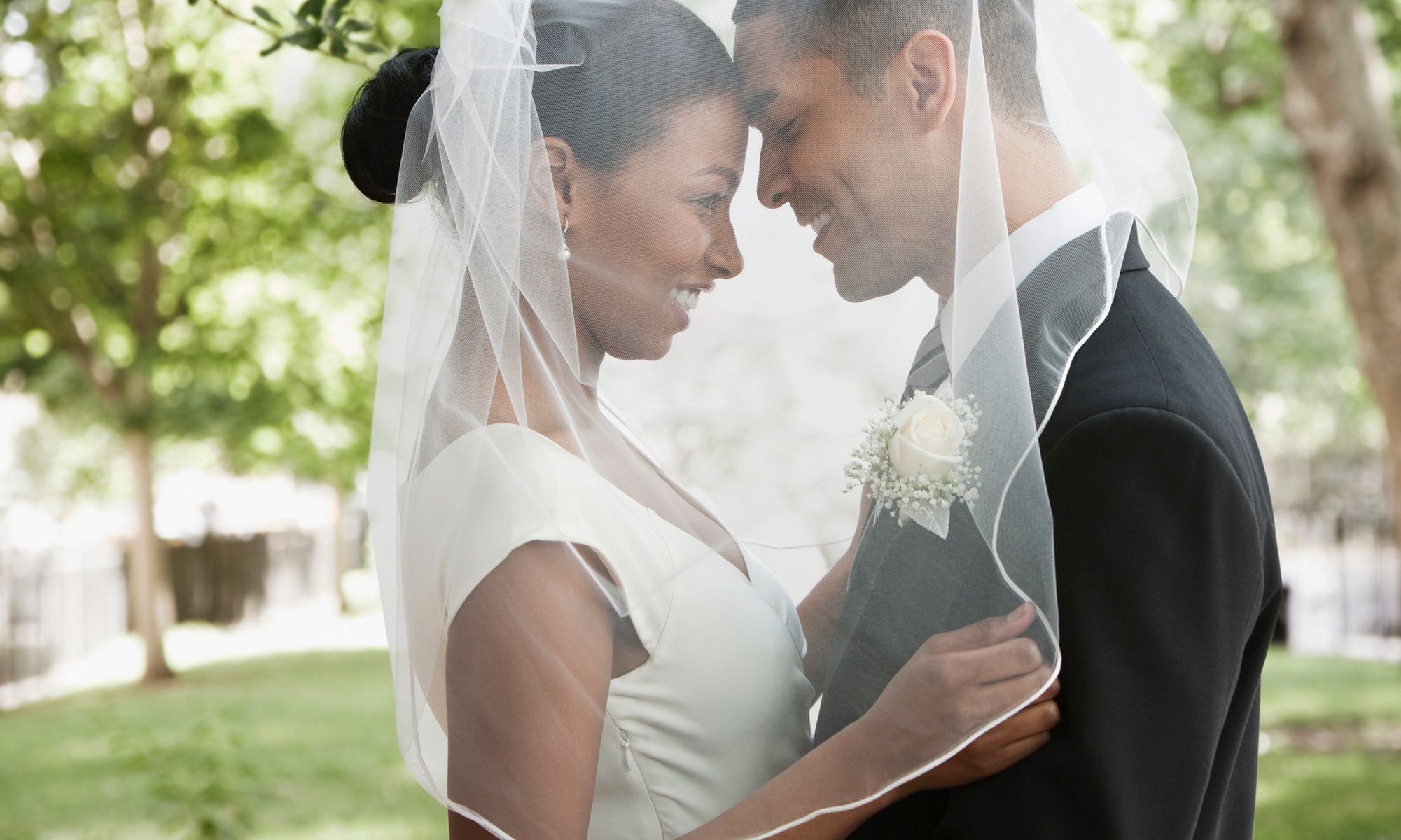 2, 4 or 6 Hours of Wedding Photography with Online Image Gallery or One Hour Engagement Session (Up to 55% Off)