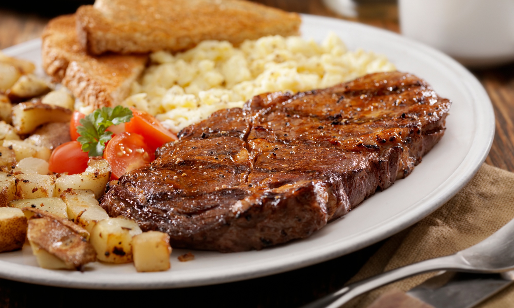 Savour Irish Cuisine: Sirloin Steak Dinner with Sides for Two or Four