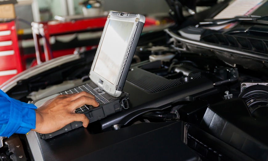 Image 1: Midas Full Vehicle Health Check-Up or Check Engine Light Diagnostics
