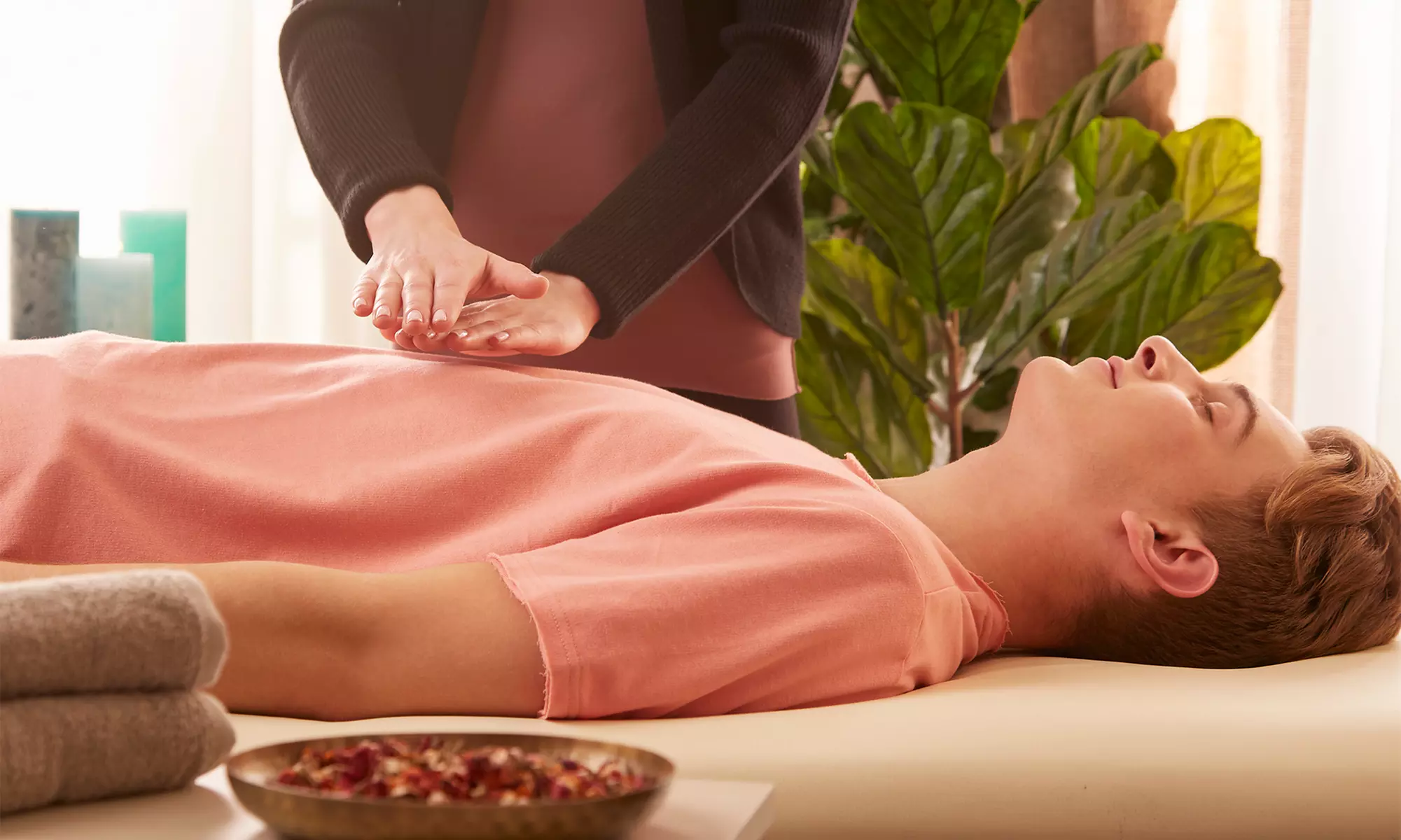Experience relaxation with Results Wellness Center's Reiki sessions, including infrared mats and aromatherapy, up to 49% off. - Primary Image