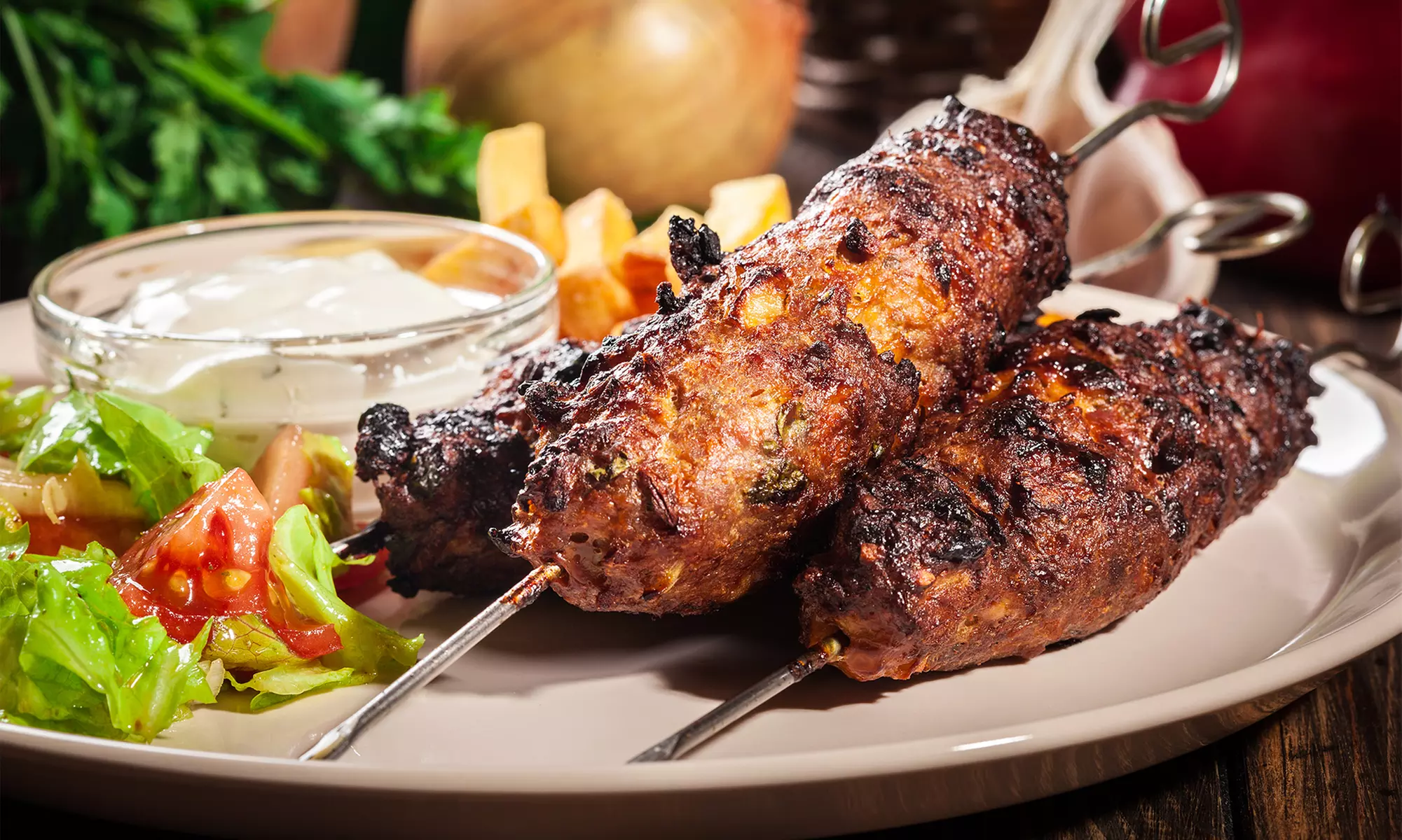Chicken Kebab, Shawarma Platter, Chicken Shawarma, or Falafel Sandwich Combo at Falafel 'N' Café (Up to 35% Off) - Primary Image