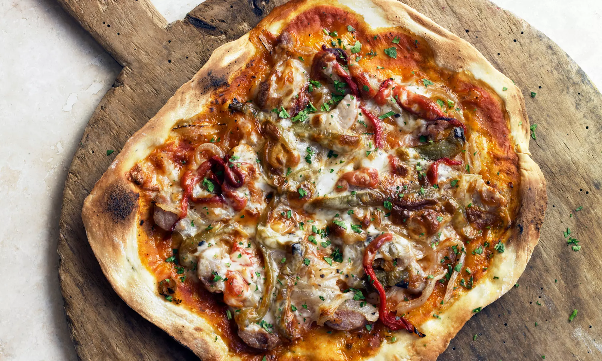 Food and Drink for Takeout and Dine-In if Available at Frenchie Pizza (Up to 33% Off). Three Options Available. - Primary Image