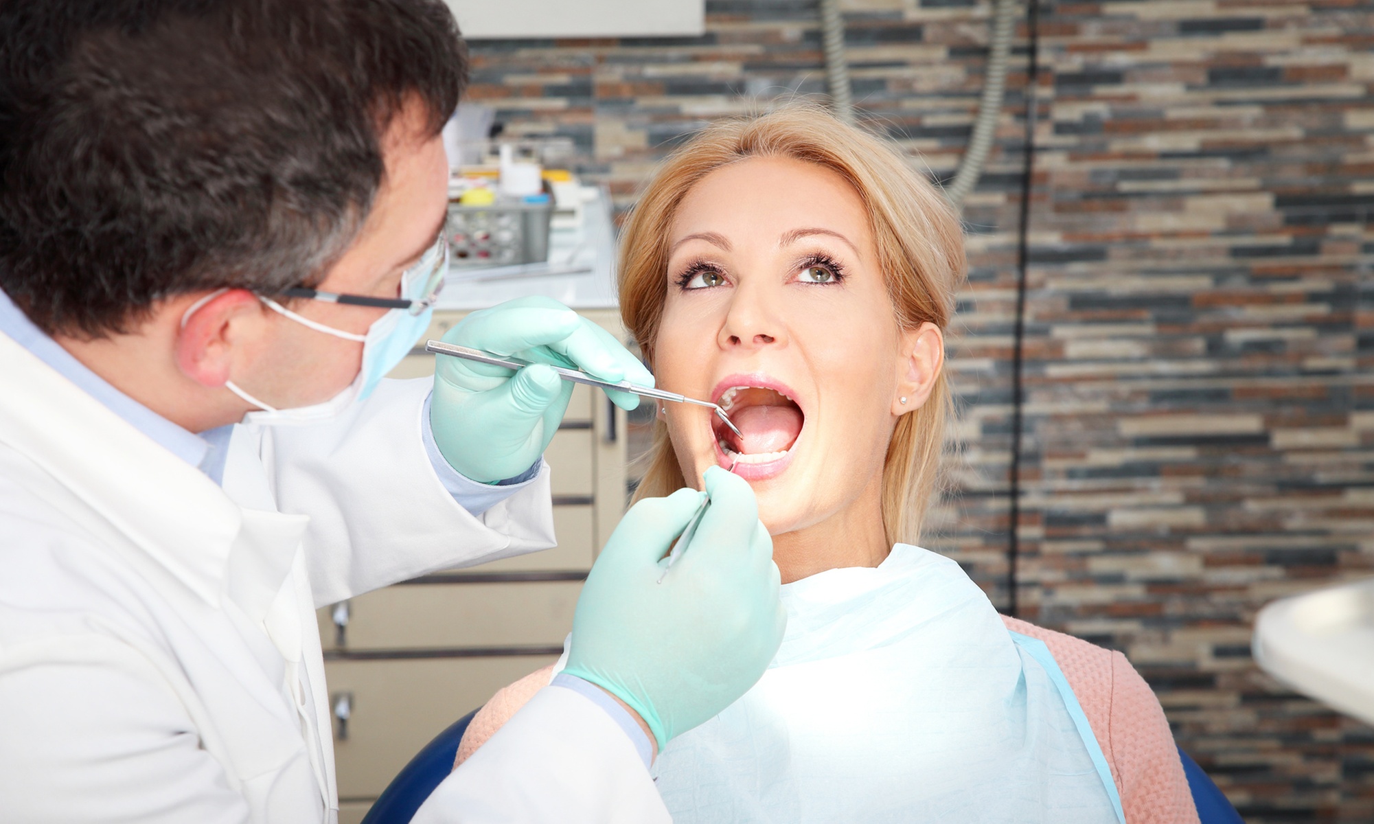 Dental Exam, X-Ray & Cleaning w/ $1,000 Toward Implant/Crown/Veneer