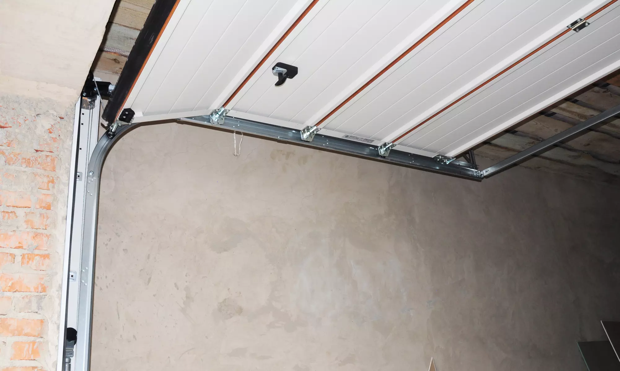 Garage Door Tune-Up, Nylon Ball Bearing Roller Replacement, or Both from Trademark Garage Door (Up to 79% Off) - Primary Image