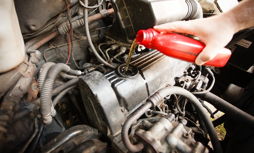Image 2: Smoother Rides Synthetic or Semi-Synthetic Oil Change + Tire Rotation 