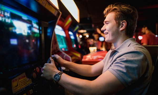 FREE $20 Game Play Credit at Dave & Busters! - Book of Free