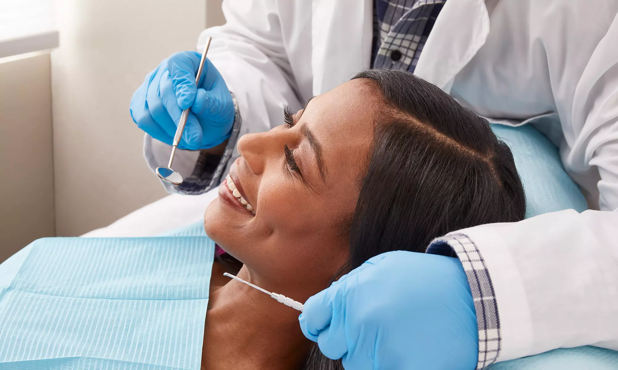 Dental Exam, X-Rays, and One or Two Cleanings at Smile Solutions Dental Group (Up to 73% Off) - Primary Image