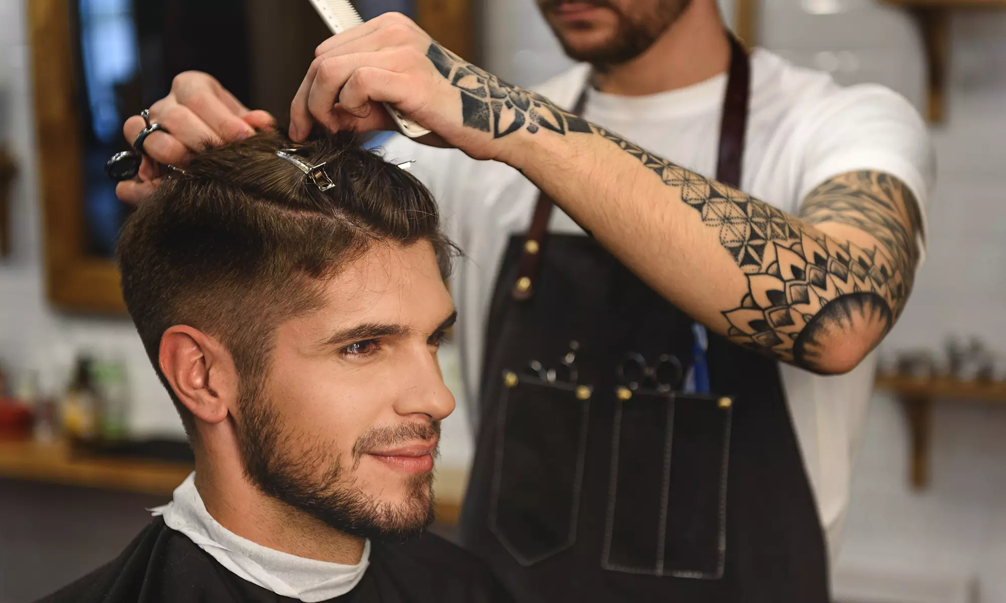 One or Three Full Service Haircuts with Hot Towel and Shave Treatment at Royal Touch Barber Shop (Up to 47% Off) - Primary Image