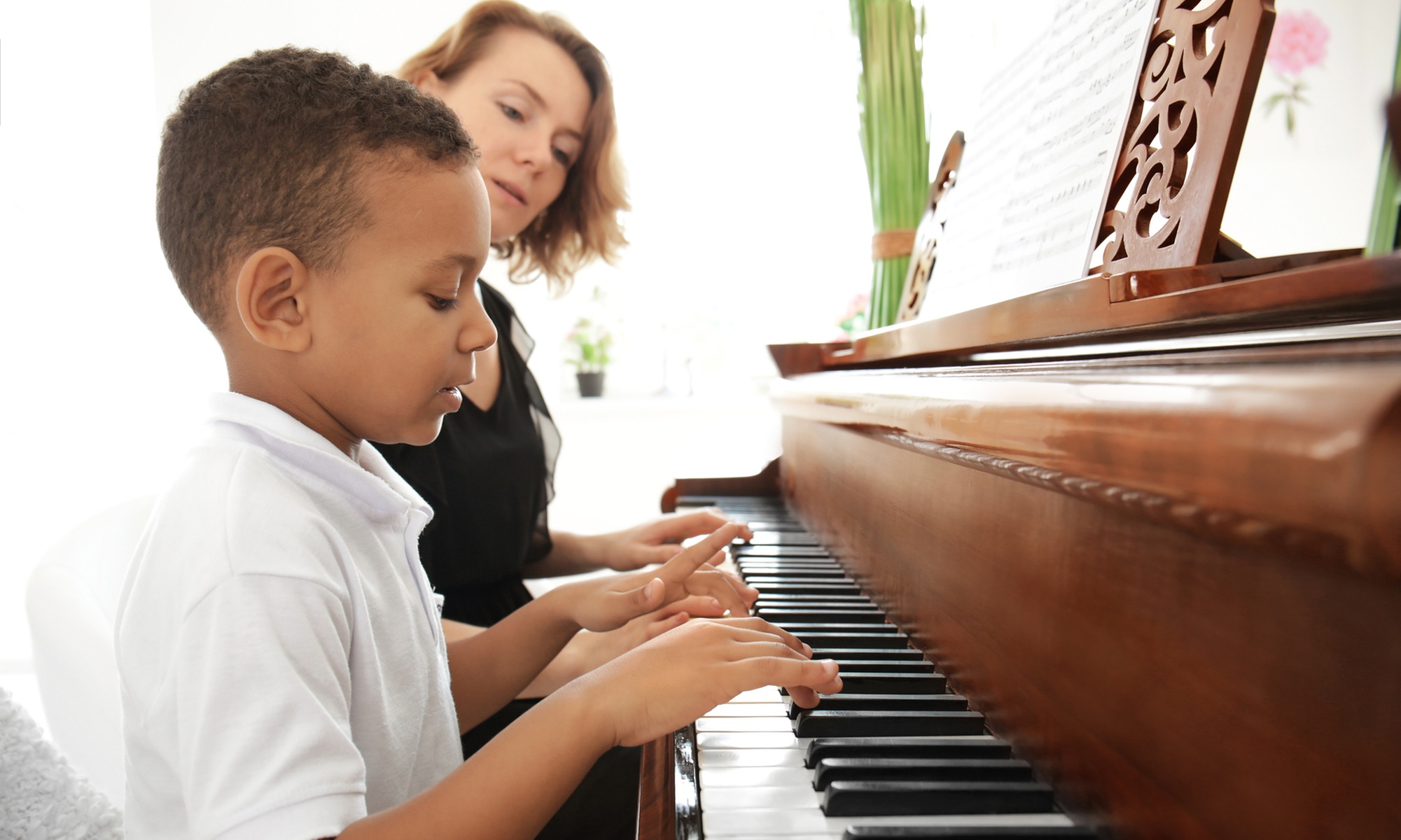 Two Private Beginner Lessons or One Month of Group Lessons 