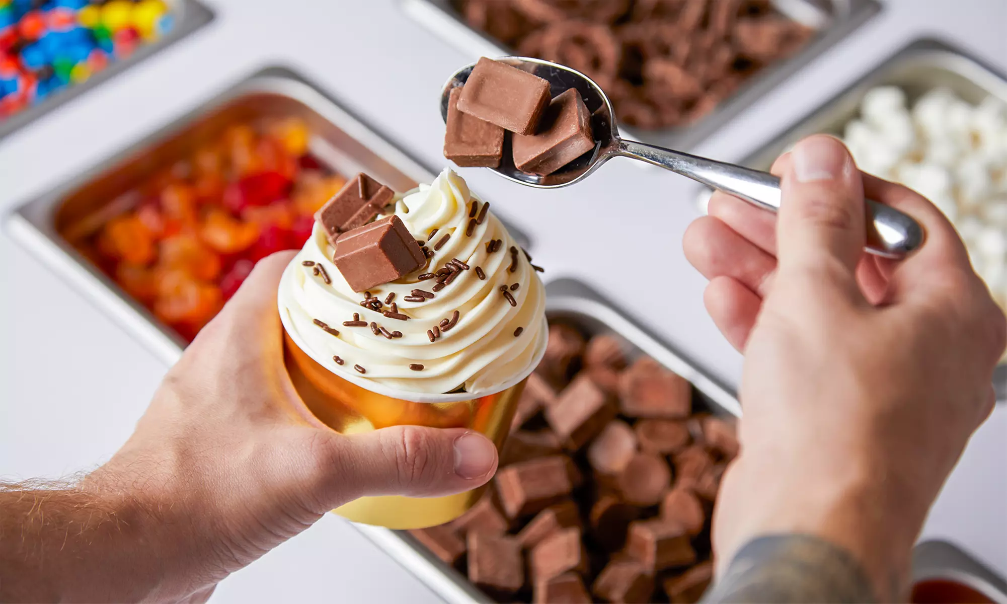 Experience Yogurtown's frozen yogurt treats with a variety of toppings, plus up to 20% off with vouchers - Primary Image