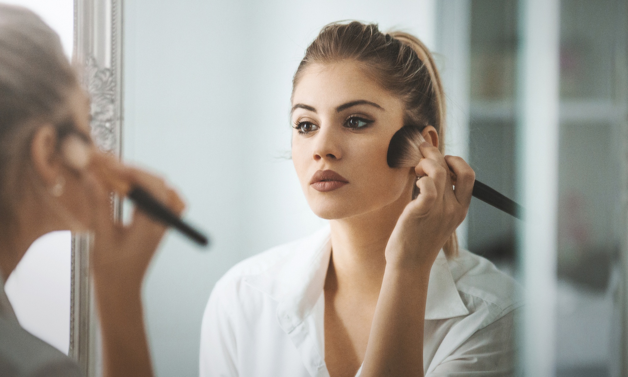 Makeup Application and Blowout for a Stunning Look