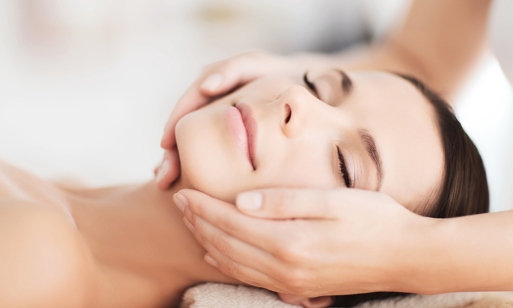 Glow w/ a 60-Min Deluxe or Back Facial/50-min Microdermabrasion Facial