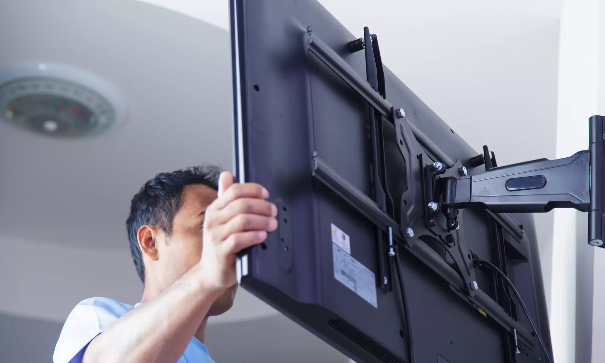 Up to 50% Off on TV / Appliance Installation at handy service - Primary Image
