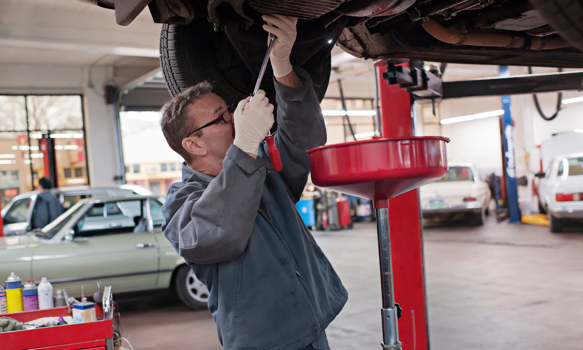 AC re-charge for one vehicle with expert technicians