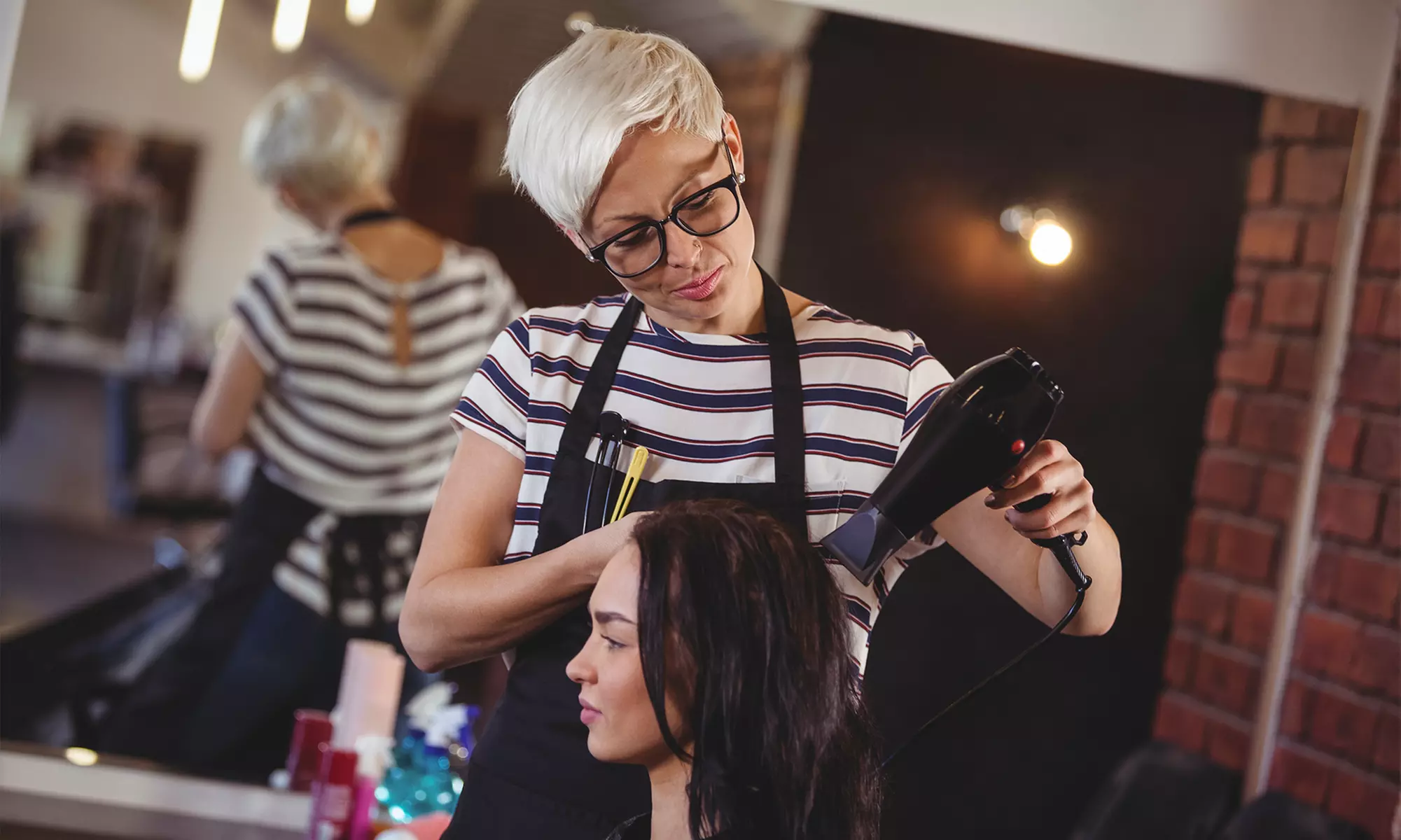 Haircut, Conditioning, Color, and Style at Karizma Salon (Up to 70% Off). Three Options Available. - Primary Image