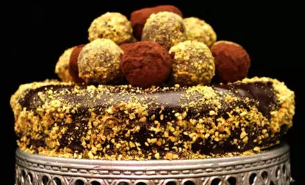 One Dozen Gourmet Signature Cupcakes or a Custom Cake at Caramel Swirls Gourmet Cakes and Pastries (Up to 51% Off) - Primary Image