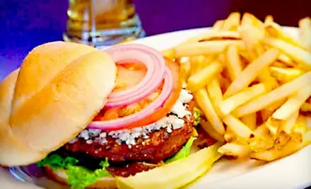 $12 for $25 Worth of Pub Fare and Drinks at Champions Sports Bar - Primary Image
