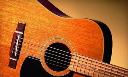 $10 for a 30-Minute Private Guitar, Drums, Piano, or Vocal Lesson at Robinson Music ($27 Value) - Primary Image
