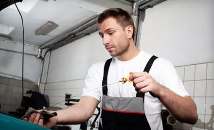 $36 for a Four-Punch Pass Oil Change, Tire Rotation, and Safety Inspection at Tuffy of Waterford ($159.96) - Primary Image