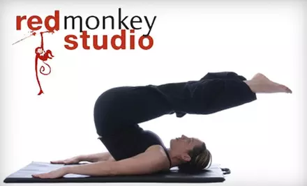 $39 for 30-Day Membership ($90 Value) or $32 for One-Hour Massage ($65 Value) at Red Monkey Studio - Primary Image