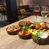 Image 1: Six, Nine, or Twelve Tapas + Glass of Wine or Pint Each For Up to 4