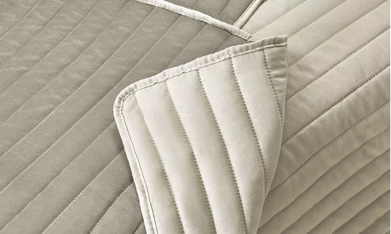 Housse de canapé matelassée bicolore