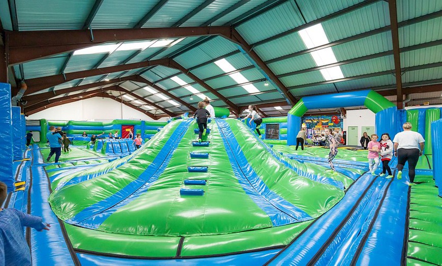 Image 1: Experience a 90-Min Inflatable Park Session For Up to Four People 