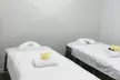 50-Min Deluxe Swedish or Custom Combo Body Massage with Massage Oil or 30-Min Custom Foot Detox (Up to 50% Off) - Second Medium