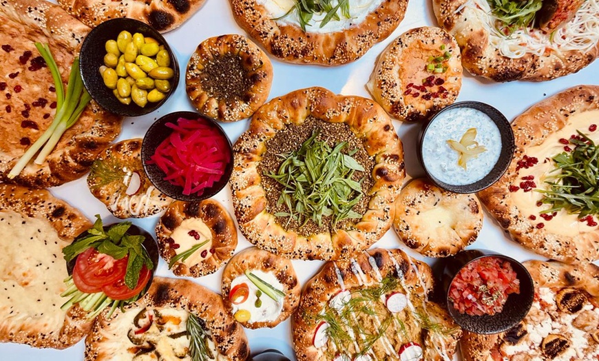 Image 1: Enjoy & Savor AED 100 , AED 200 or AED 300 to spend towards the Menu 