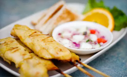 $21 for Asian Snacks for Two with Appetizers and a Pitcher of Beer at Hu's Bar and Grill (Up to $42 Value) - Primary Image