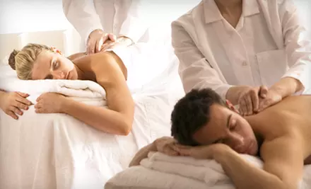 Spa Escape for One or Valentine's Spa Package for Two with Massages, Facials, and Foot Masks at Massage 49 (Half Off) - Primary Image