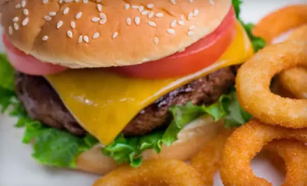 $15 for a Pub Meal with an Appetizer and Entrees for Two at Magoo's (Up to $32.97 Value) - Primary Image