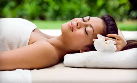 $65 for a Spa Package with a Swedish Massage, Mini Facial, Reflexology, and Afternoon Tea at Spa Exo'tique ($135 Value) - Primary Image