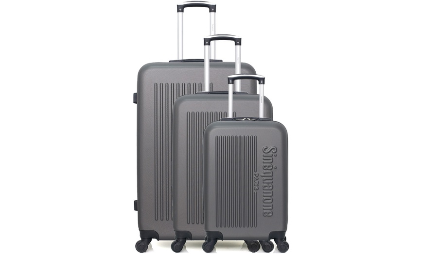 Image 16: Set of Three Suitcases