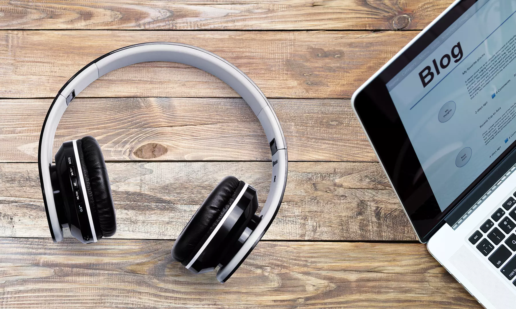 One or Two White Bluetooth Headsets - Primary Image